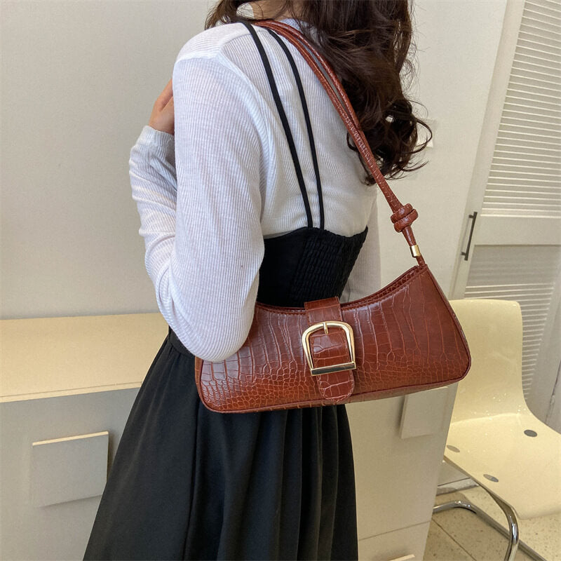 Schultertasche mit Struktur: Klassik trifft Charakter